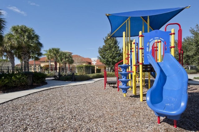 436 Orange Cosmos Blvd, Davenport, FL 33837 - communal playground featuring fence