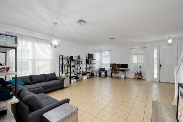 436 Orange Cosmos Blvd, Davenport, FL 33837 - living room featuring light tile patterned floors and an office area