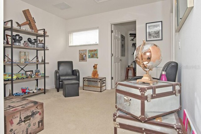 436 Orange Cosmos Blvd, Davenport, FL 33837 - sitting room featuring carpet flooring