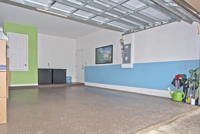 436 Orange Cosmos Blvd, Davenport, FL 33837 - garage with electric panel and baseboards