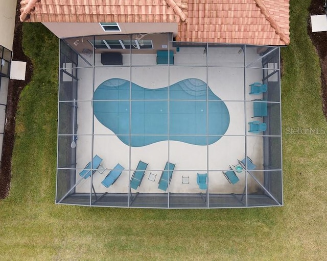 436 Orange Cosmos Blvd, Davenport, FL 33837 - drone / aerial view of a pool area