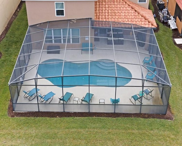 436 Orange Cosmos Blvd, Davenport, FL 33837 - view of basketball court featuring a lawn