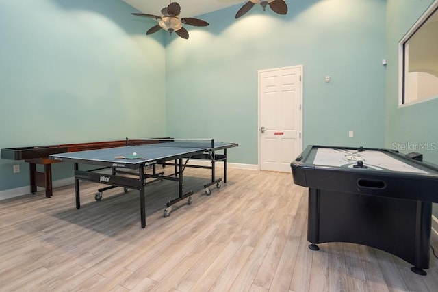 436 Orange Cosmos Blvd, Davenport, FL 33837 - playroom featuring a towering ceiling, ceiling fan, light wood-type flooring, and baseboards