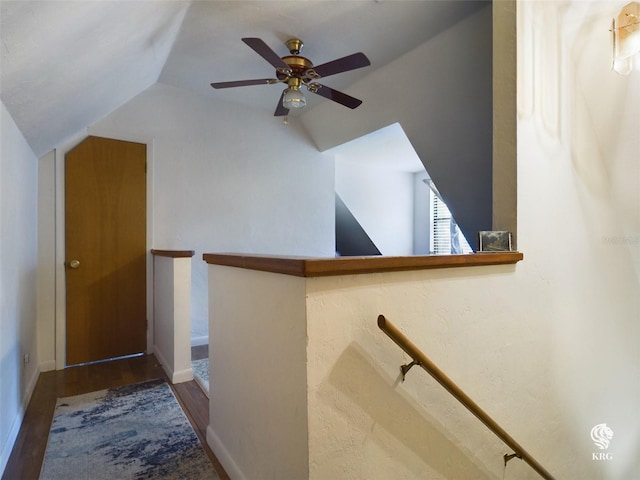 interior space with lofted ceiling, ceiling fan, and hardwood / wood-style flooring