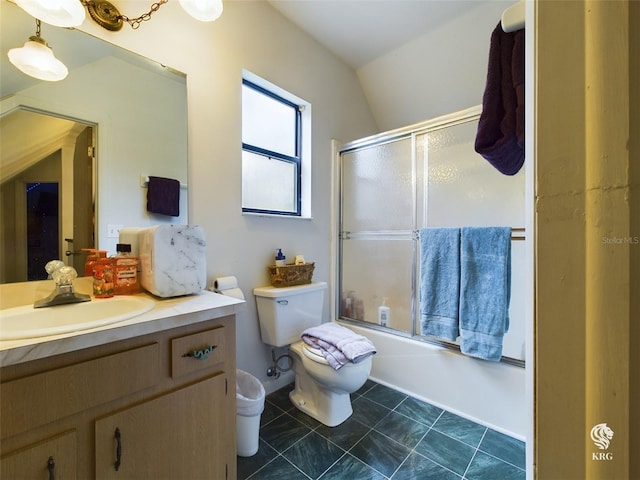 full bathroom with shower / bath combination with glass door, toilet, vanity, and vaulted ceiling