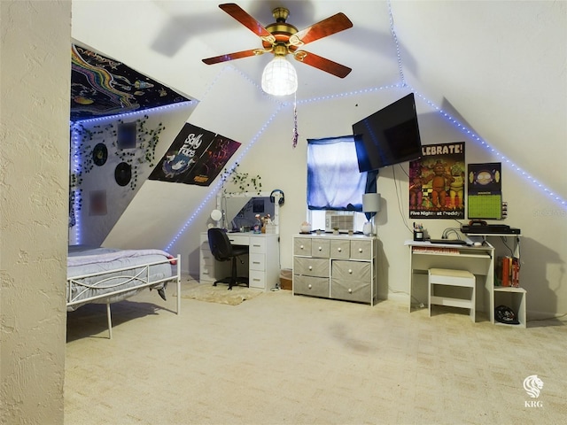 interior space with carpet flooring, lofted ceiling, and ceiling fan