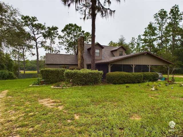 exterior space with a front lawn