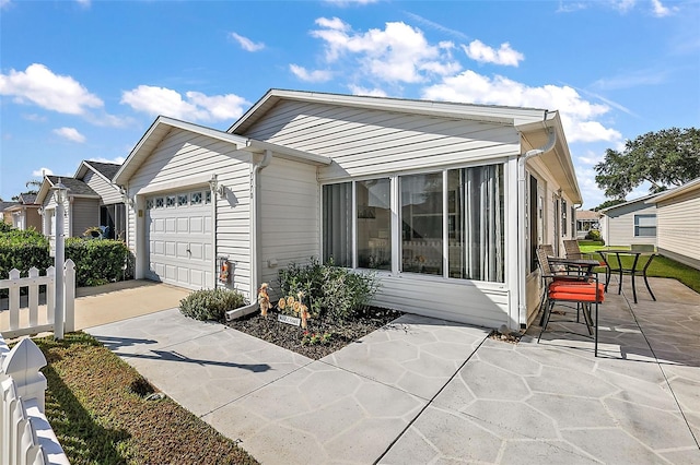 exterior space with a garage