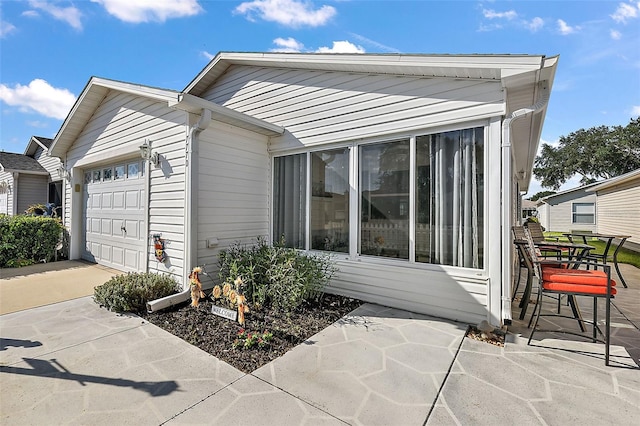 view of home's exterior with a garage