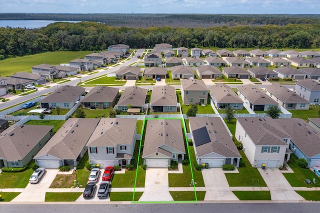 3654 Caspian St, Leesburg, FL 34748 - bird's eye view featuring a water view, a wooded view, and a residential view