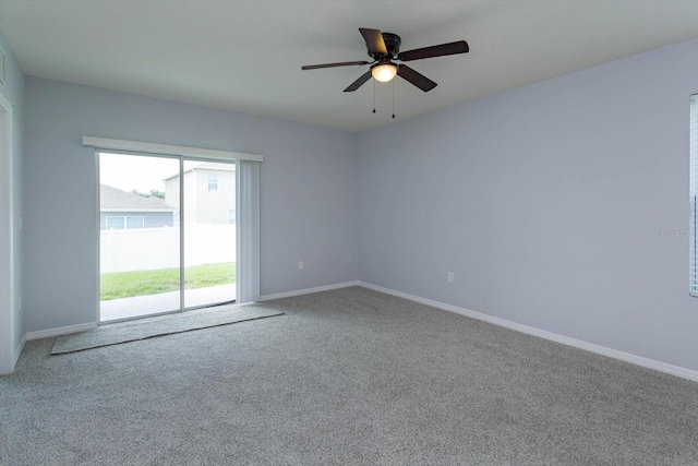 carpeted empty room with ceiling fan