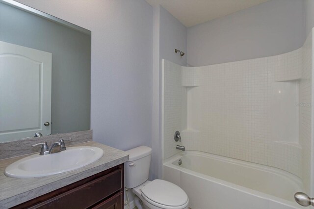 full bathroom with vanity, toilet, and shower / bathing tub combination