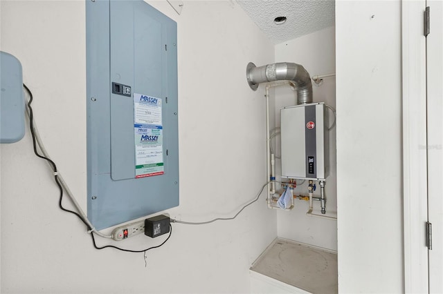 utility room with water heater and electric panel