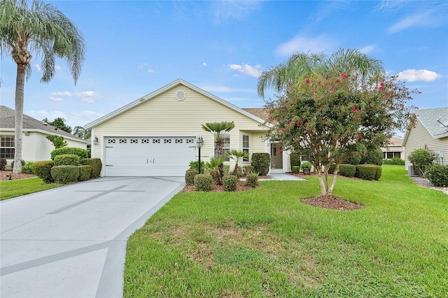 ranch-style home with a garage and a front lawn