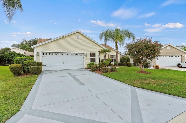 single story home with a garage and a front lawn