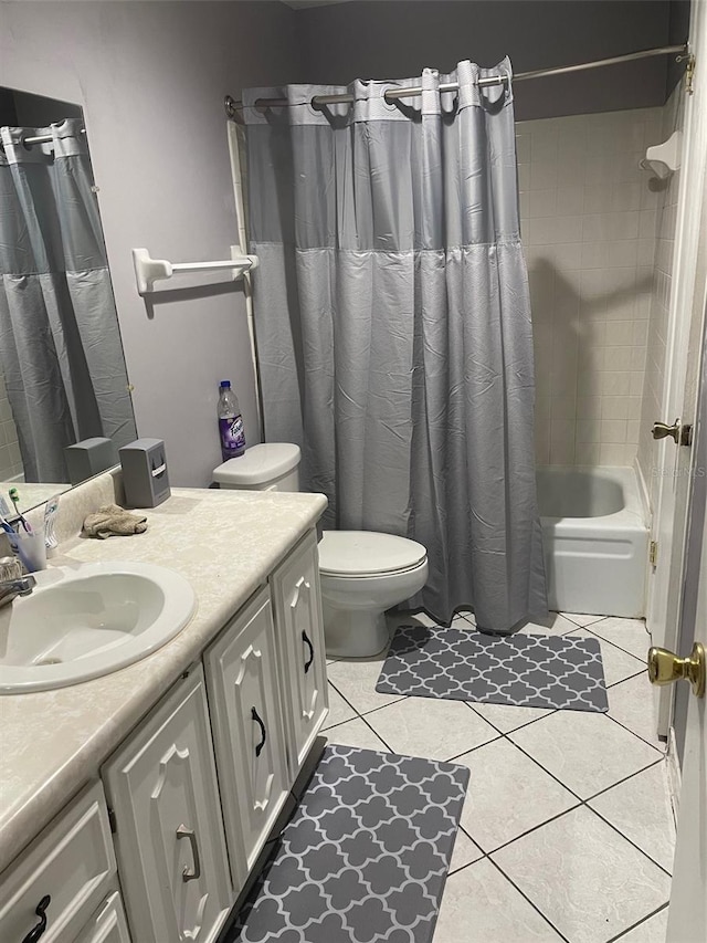 full bathroom with tile patterned flooring, vanity, toilet, and shower / tub combo with curtain