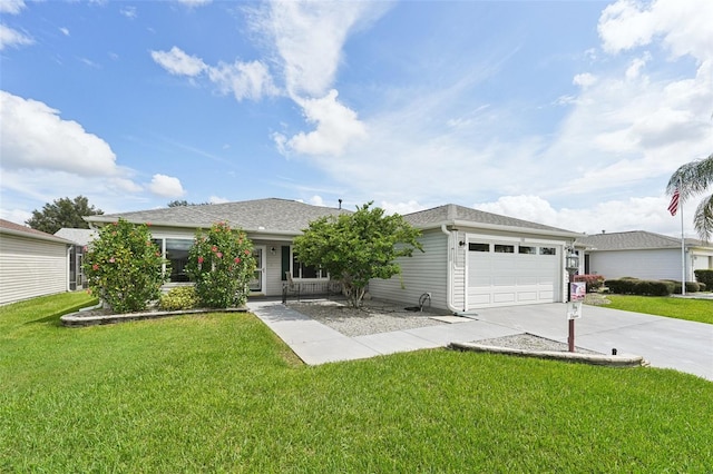 view of front facade featuring a garage and a front lawn