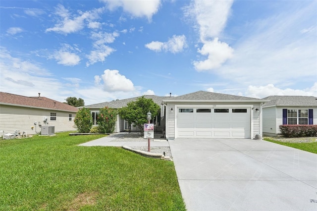 ranch-style house with central AC, a front lawn, and a garage