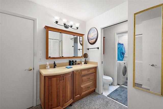 bathroom with tile patterned floors, vanity, and toilet