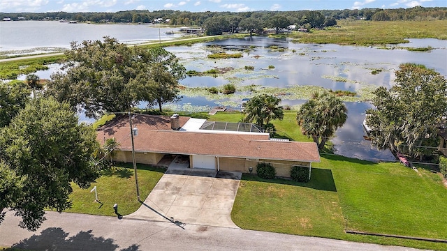 bird's eye view with a water view