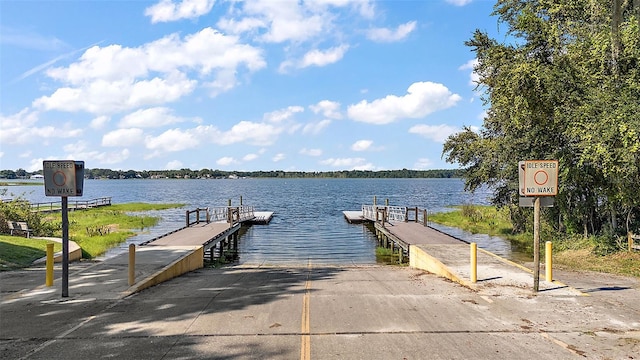 dock area featuring a water view