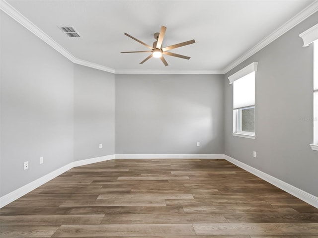 spare room featuring ornamental molding, ceiling fan, and dark hardwood / wood-style flooring