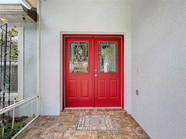 view of exterior entry with french doors