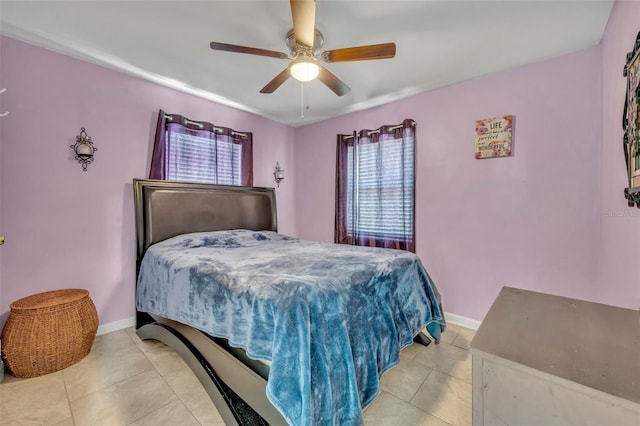 bedroom with light tile patterned flooring and ceiling fan