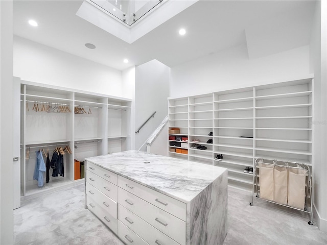 walk in closet with a skylight