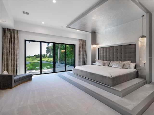 bedroom featuring carpet floors and access to outside