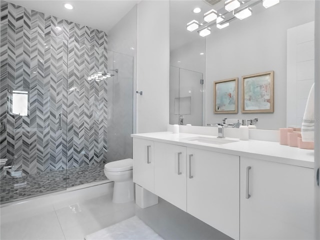 bathroom featuring walk in shower, tile patterned flooring, vanity, and toilet