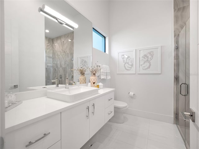 bathroom featuring tile patterned flooring, a shower with shower door, vanity, and toilet