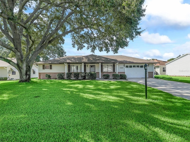 single story home with a front lawn and a garage