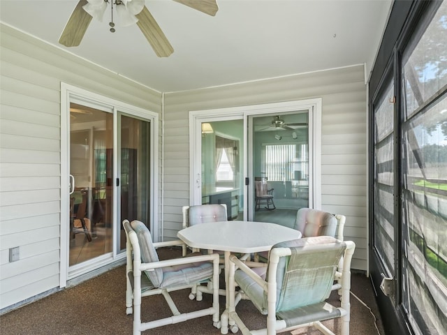 sunroom / solarium with ceiling fan