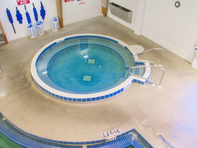 view of pool featuring an indoor in ground hot tub