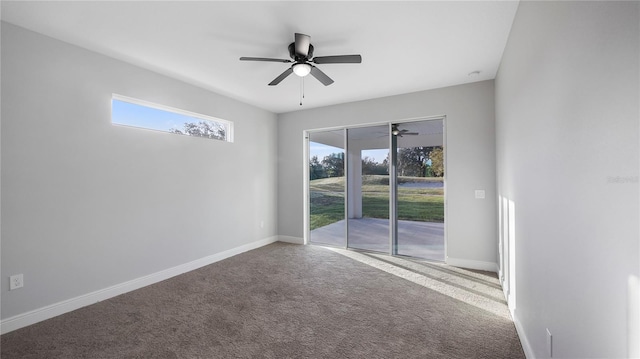 carpeted empty room with ceiling fan