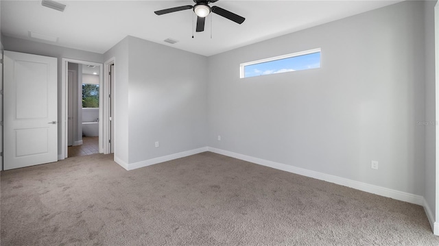 unfurnished bedroom featuring carpet floors and ceiling fan