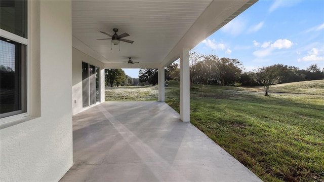 view of patio with ceiling fan