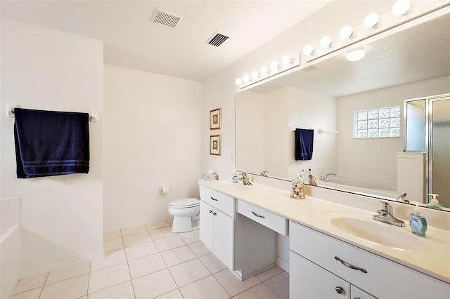 full bathroom featuring separate shower and tub, tile patterned flooring, vanity, and toilet