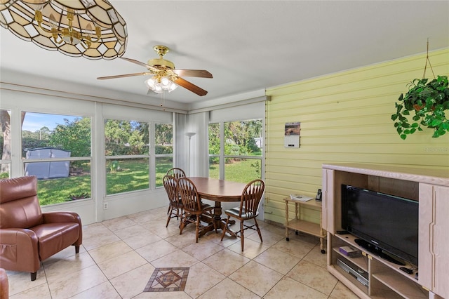 sunroom / solarium with ceiling fan