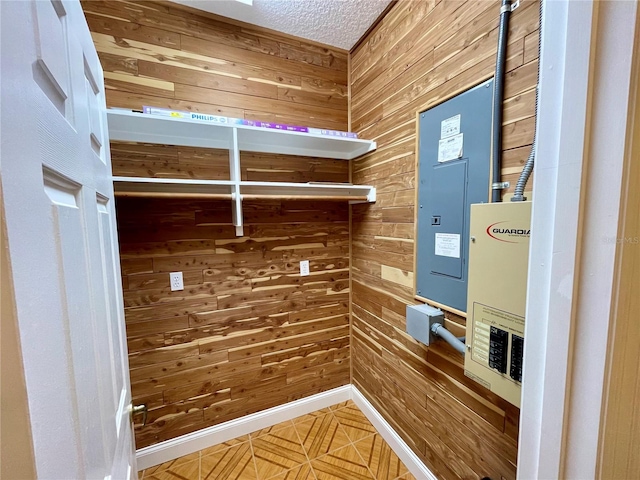 walk in closet featuring electric panel