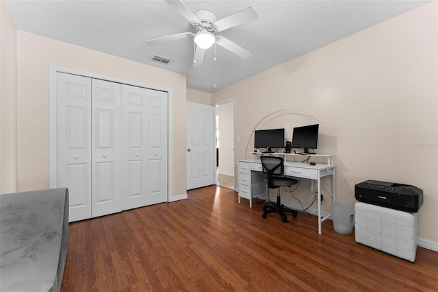 home office featuring ceiling fan and hardwood / wood-style flooring