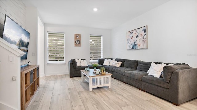 living room with light hardwood / wood-style floors