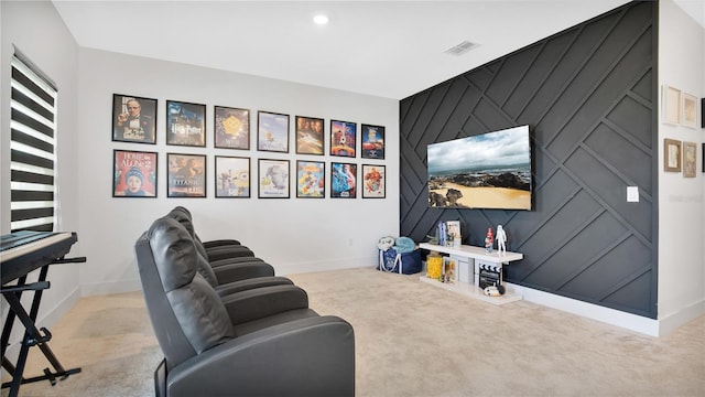 sitting room featuring light carpet