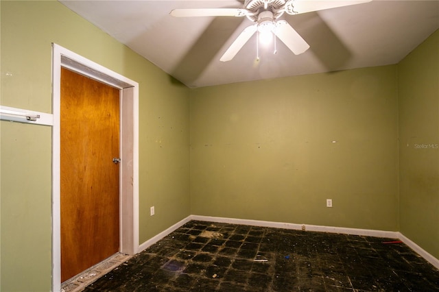 spare room with ceiling fan