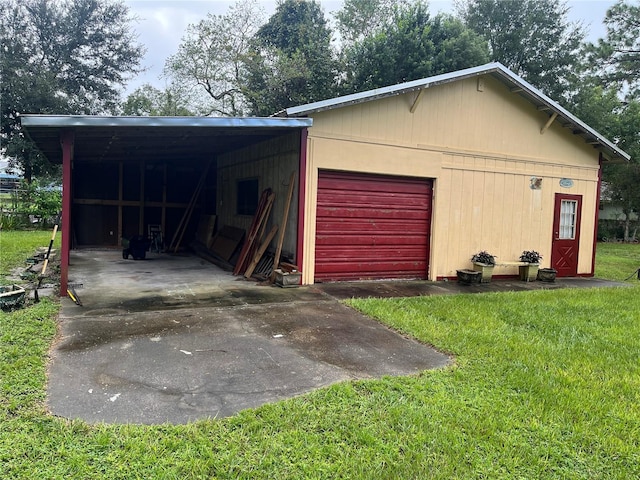 garage with wood walls and a yard