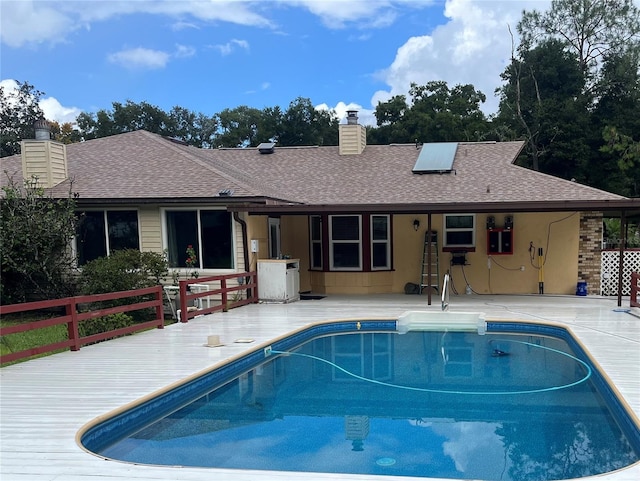 view of pool with a deck