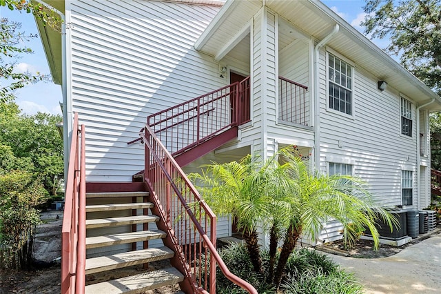 view of side of property with central AC