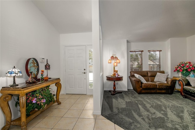 entrance foyer with light tile patterned floors