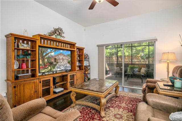 living room with hardwood / wood-style floors and ceiling fan